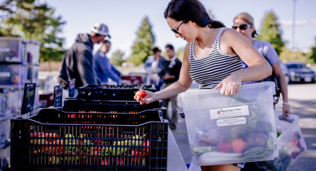 picking up the csa box