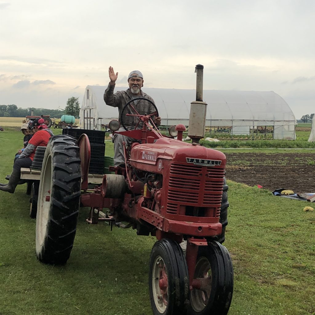 Isaiah on tractor